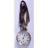 AN ANTIQUE SILVER POCKET WATCH. 5 cm wide.