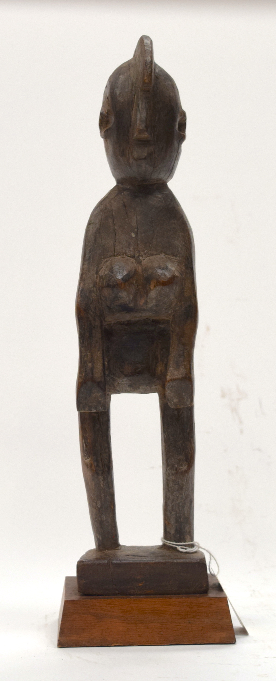 A TRIBAL MOSSI FIGURE. Burkina Faso. 12cm x 10cm x 38cm