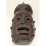 A TRIBAL WIDIKUM FACE MASK. Cameroon. 23cm x 19cm x 45cm