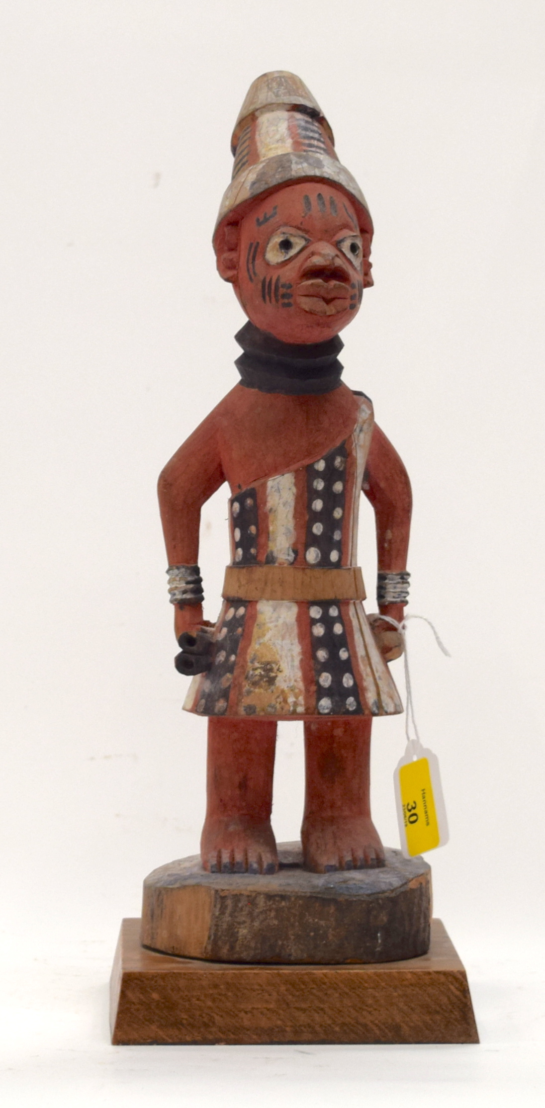 A TRIBAL YORUBA FIGURE. Nigeria. 14cm x 15cm x 38cm