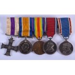 FIVE MINIATURE MILITARY MEDALS including the military cross. (5)