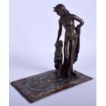 A COLD PAINTED BRONZE GROUP OF NUDE FEMALE modelled leaning beside a lioness. 18 cm x 14 cm.