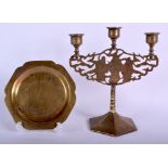 A 19TH CENTURY JAPANESE MEIJI PERIOD BRASS CANDLESTICK together with a scalloped dish. (2)