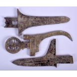 THREE CHINESE BRONZE WEAPON FRAGMENTS. Largest 22 cm long. (3)