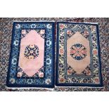 TWO CHINESE PEKING SCATTER RUGS. 94 cm x 62 cm. (2)