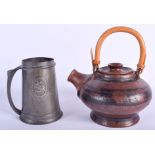 AN ARTS AND CRAFTS STYLE TUDRIC PEWTER MUG together with a studio pottery teapot. Largest 16 cm wide