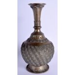 A 19TH CENTURY INDIAN SPIRAL FORM BRONZE VASE decorated with dimples. 24 cm x 8 cm.