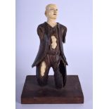 A VERY UNUSUAL 18TH/19TH CENTURY CONTINENTAL CARVED IVORY FIGURE possibly Bavarian. 18 cm x 9 cm.