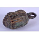 A CHINESE BRONZE WEIGHT. 7 cm long.