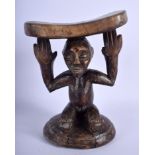 AN EARLY 20TH CENTURY AFRICAN TRIBAL FERTILITY STOOL. 22 cm x 17 cm.