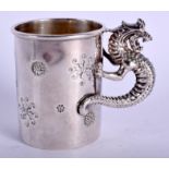 A WHITE METAL DRAGON CUP. 6 cm high.