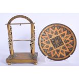 A 19TH CENTURY CONTINENTAL BRONZE WATCH HOLDER together with a dish. (2)