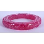 A CHINESE PURPLE JADE BANGLE. 7.5 cm wide.