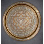 A LARGE MIDDLE EASTERN SILVER INLAID CAIROWARE STYLE CHARGER. 69 cm diameter.