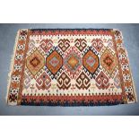 SIX ANTIQUE RUGS in various forms and sizes. (6)