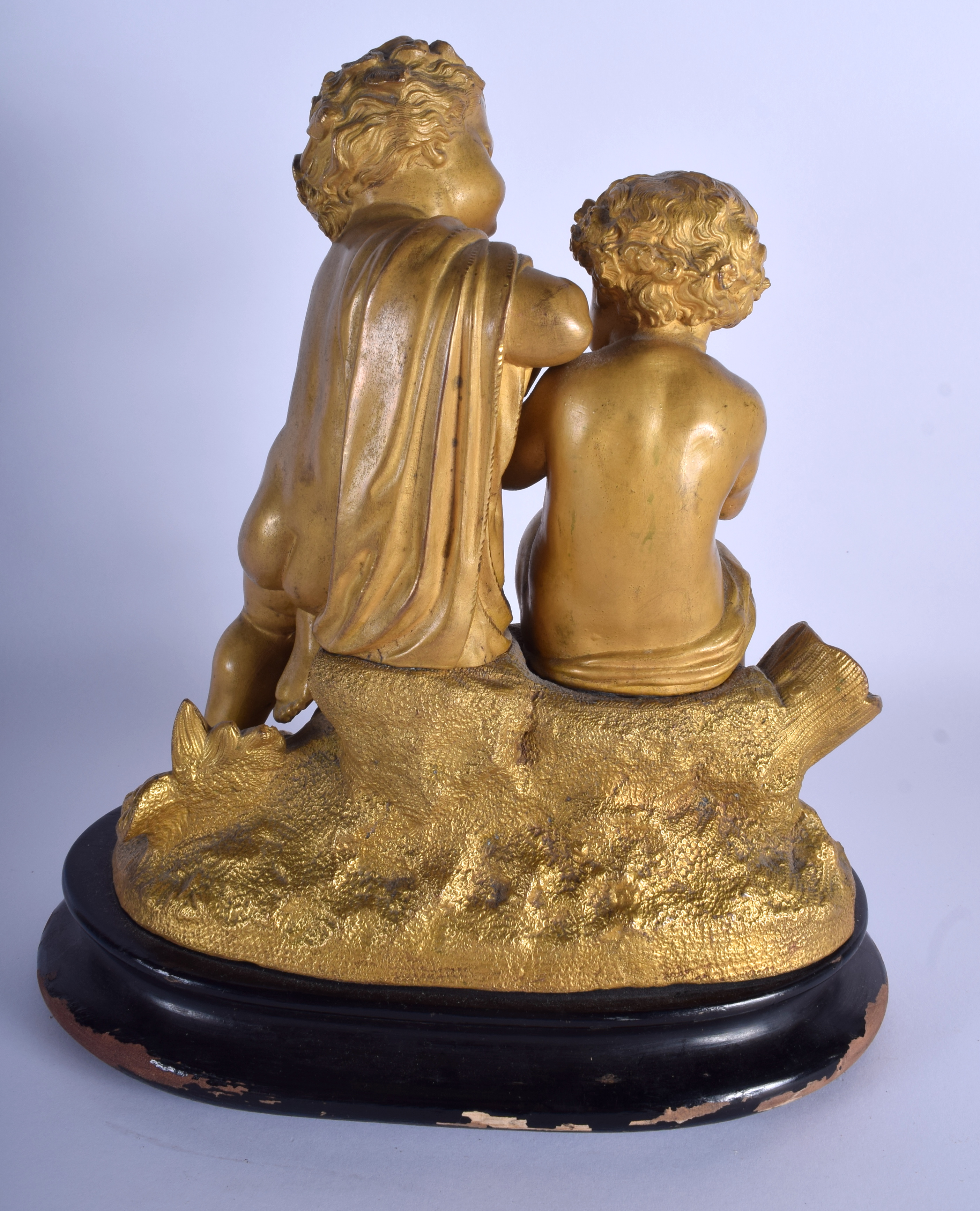 A 19TH CENTURY FRENCH GILDED SPELTER FIGURE OF TWO PUTTI modelled upon am eboinsed base. 21 cm x 27 - Bild 2 aus 3
