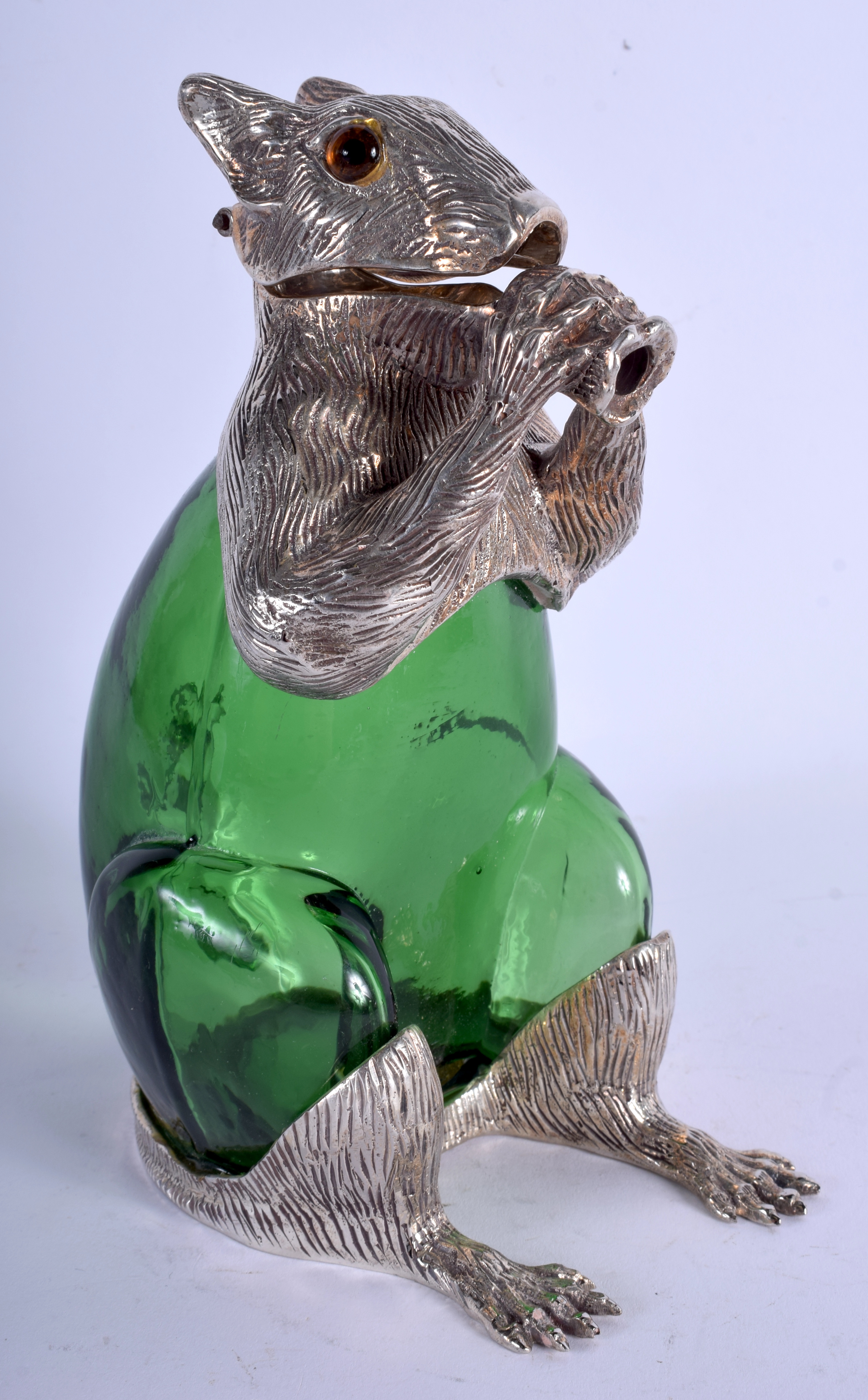 A CONTEMPORARY SILVER PLATED GREEN GLASS SQUIRREL DECANTER. 21 cm high.