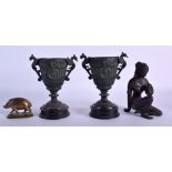 A 19TH CENTURY INDIAN BRONZE FIGURE OF A DEITY together with others. Largest 14 cm high. (4)