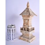 A 19TH CENTURY JAPANESE MEIJI PERIOD CARVED IVORY BUDDHISTIC PAGODA. 30 cm x 9 cm.