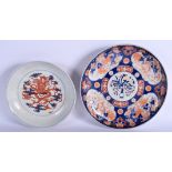 A LARGE 19TH CENTURY JAPANESE MEIJI PERIOD IMARI CHARGER together with a dragon dish. 30 cm & 24 cm