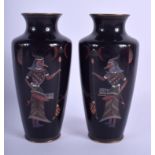 AN UNUSUAL PAIR OF 19TH CENTURY JAPANESE MEIJI PERIOD CLOISONNE ENAMEL VASES decorated with Egyptian