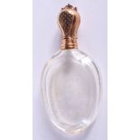 AN ANTIQUE 18CT GOLD FRENCH CRYSTAL SCENT BOTTLE. 9.5 cm high.