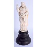 A 19TH CENTURY EUROPEAN DIEPPE IVORY FIGURE OF A SAINT modelled upon an eboinsed base. Ivory 12.5 cm