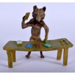 A COLD PAINTED BRONZE GAMBLING FOX. 11 cm x 11 cm.