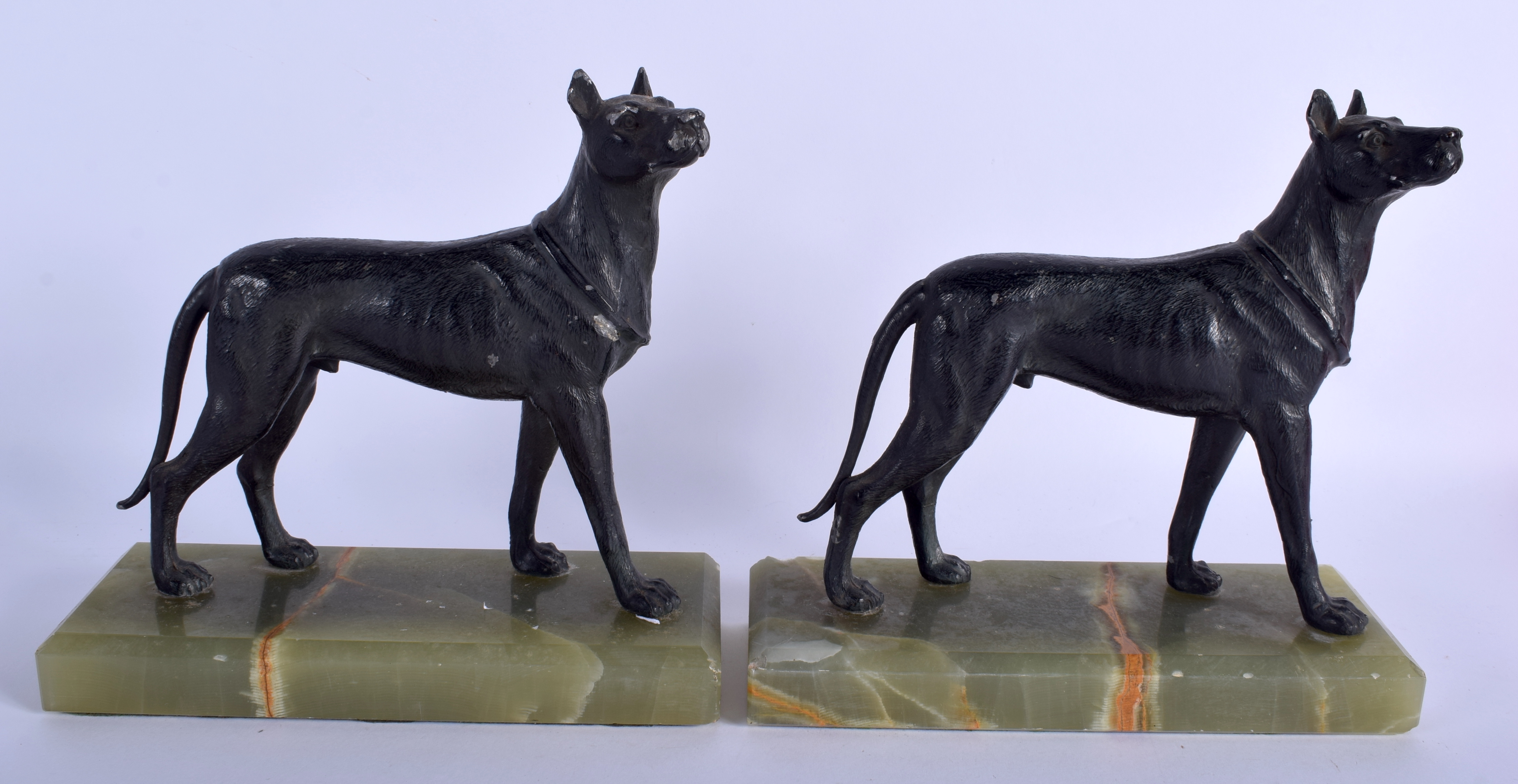 A PAIR OF ART DECO SPELTER HOUNDS upon onyx bases. 21 cm x 21 cm.