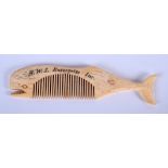 A NOVELTY BONE WHALE COMB. 8 cm wide.