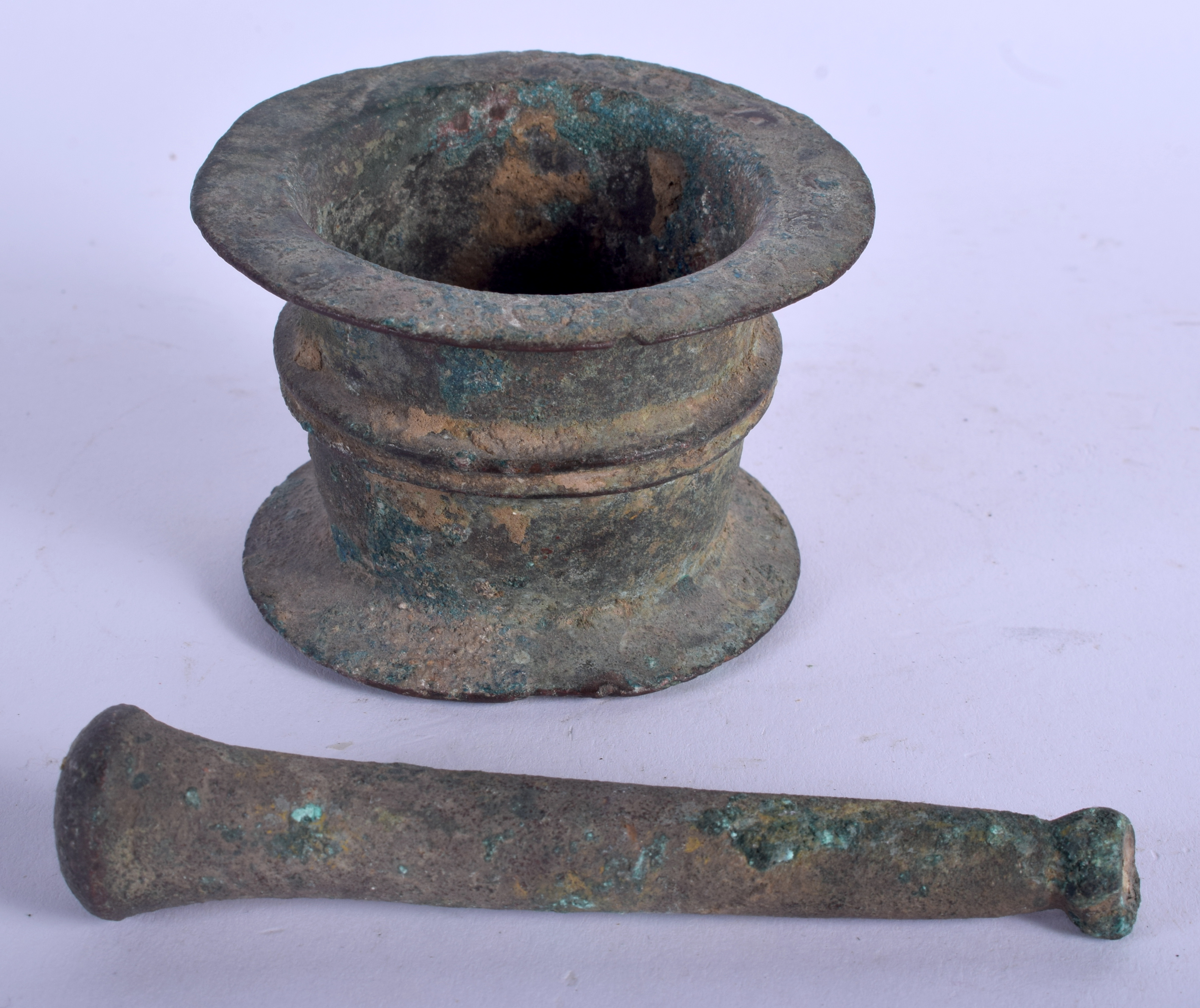 A 14TH/15TH CENTURY ISLAMIC BRONZE PESTLE AND MORTAR. 8 cm wide. (2) - Image 2 of 3