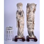 A LARGE PAIR OF EARLY 20TH CENTURY CHINESE CARVED IVORY FIGURES Late Qing, modelled in dragon embell