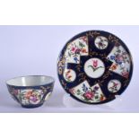 Worcester teabowl and saucer painted with flowers in fan panels on a powder blue ground. 11.5 cm wid