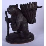 A 19TH CENTURY BAVARIAN BLACK FOREST CARVED WOOD DECANTER HOLDER modelled as a smoking bear. 27 cm x