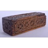 AN 18TH CENTURY CONTINENTAL FRUITWOOD TREEN DOMINOS BOX carved with circular motifs. 17 cm x 6 cm.