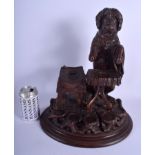 A RARE 19TH CENTURY BAVARIAN BLACK FOREST CARVED WOOD BEGGING HOUND DRINKS HOLDER modelled standing