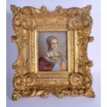 A 19TH CENTURY CONTINENTAL PAINTED IVORY PORTRAIT MINIATURE within a gilt wood frame. Image 8 cm x 9