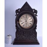 A LARGE 19TH CENTURY CHINESE CARVED HONGMU MANTEL CLOCK Qing, retailed by Charles J Gaupp & Co of Ho
