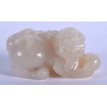 AN EARLY 20TH CENTURY CHINESE CARVED GREYISH WHITE JADE BEAST Late Qing/Republic. 7 cm x 4 cm.