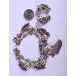 A VICTORIAN SHILLING and silver jewellery. (4)