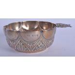 AN ARTS AND CRAFTS SILVER WINE TASTER possibly by Henry Wilmot or Henry Williamson. 2.1 oz. 9 cm.