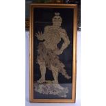 A RARE 18TH CENTURY JAPANESE EDO PERIOD EMBROIDERED PANEL depicting a buddhistic temple guardian upo
