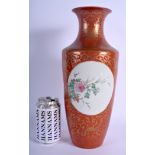 AN EARLY 20TH CENTURY CHINESE CORAL GROUND PORCELAIN VASE Qing, bearing Qianlong marks to base. 35 c