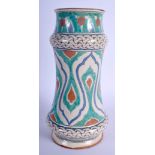 A MIDDLE EASTERN ISLAMIC SPANISH ALBARELLO VASE painted with foliage and vines. 28 cm high.