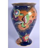 A RETRO CARLTONWARE POTTERY VASE painted with birds amongst foliage. 25 cm x 12 cm.