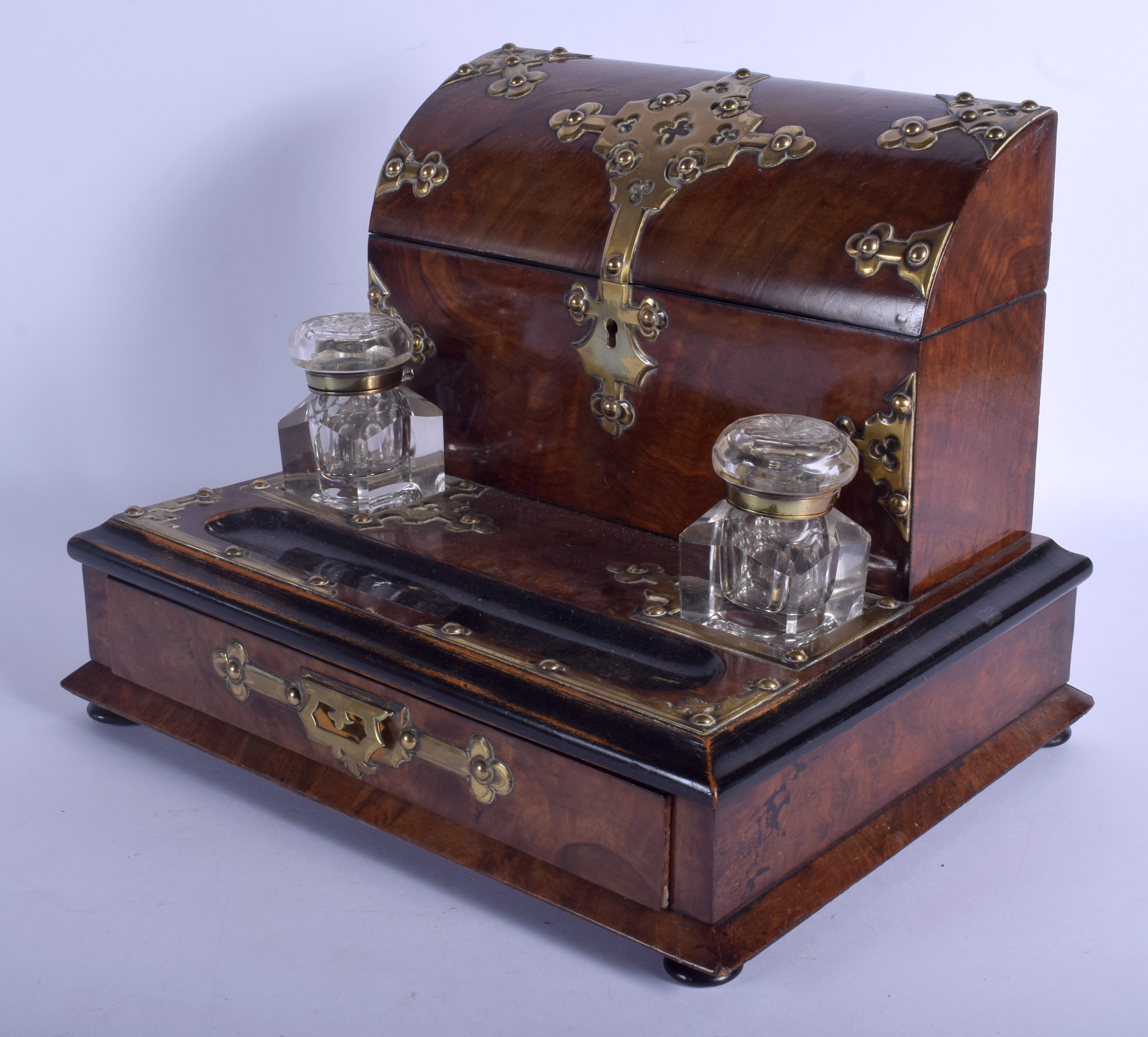 A LATE VICTORIAN BURR WALNUT BRASS BOUND INKWELL in the Gothic revival manner. 33 cm x 31 cm.