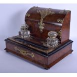 A LATE VICTORIAN BURR WALNUT BRASS BOUND INKWELL in the Gothic revival manner. 33 cm x 31 cm.