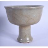 A 19TH CENTURY CHINESE CRACKLE GLAZED CELADON STEM CUP decorated with lotus moulding. 10 cm x 8 cm.