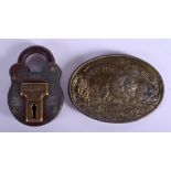 A VINTAGE AMERICAN GREAT BUFFALO TRADING COMPANY BELT BUCKLE together with a padlock. (2)