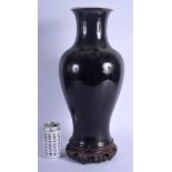 A LARGE 19TH CENTURY CHINESE BLACK GLAZED PORCELAIN VASE Qing, bearing Kangxi marks to base. Vase 45
